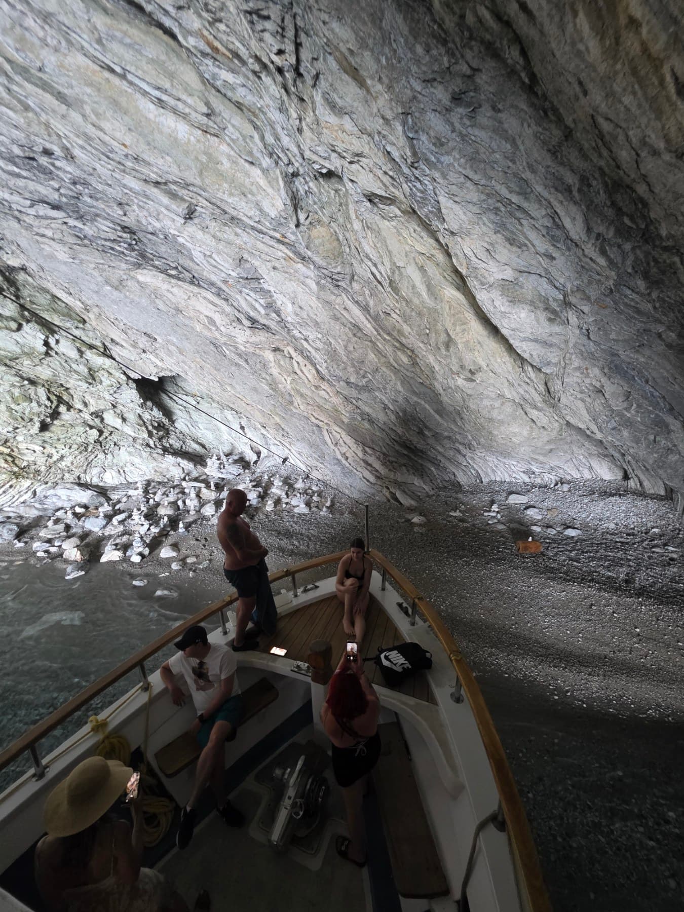Cave Papanikolis with the ionian star wooden boat